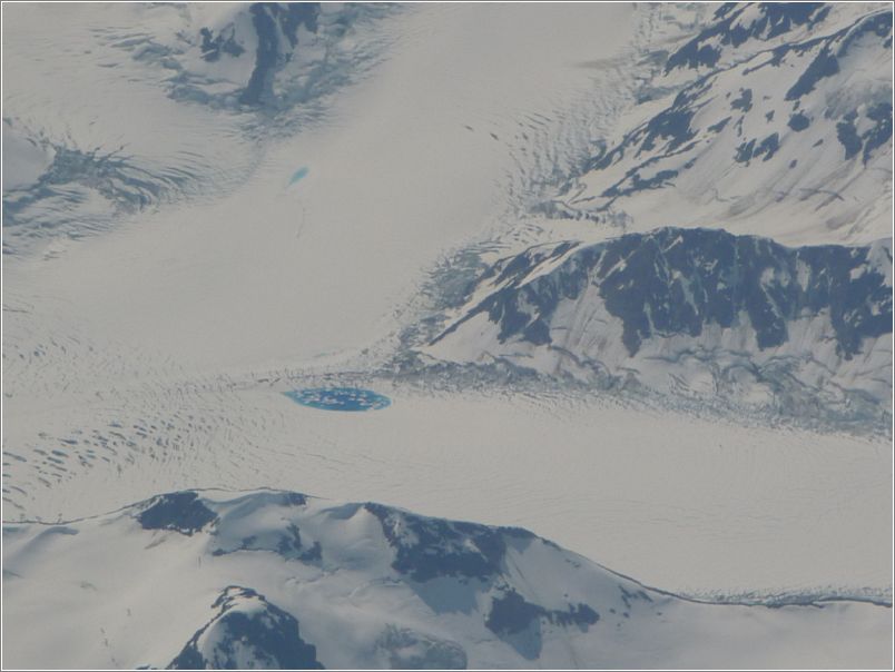 Glacier, note blue lake
