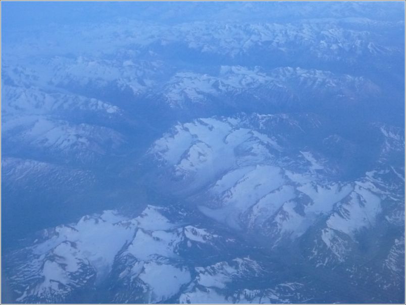 Flying home; finally getting dark